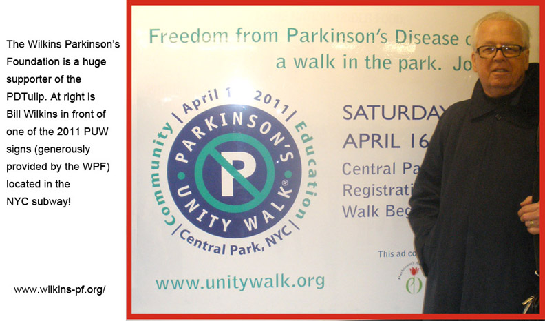 BIll WIlkins of Wilkins Parkinson's Foundation in front of one of the PUW subway signs showing the PDTulip